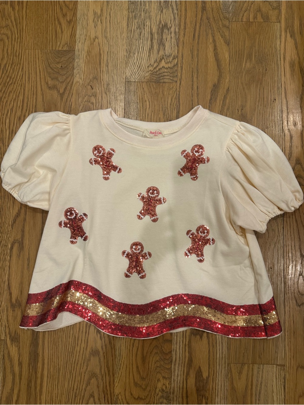 Peach Love California Cream Short Sleeve Puff Top with Red & Gold Sequin Details